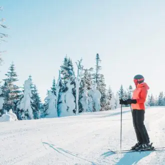 Skiier on a slope in Tremblant Canada
