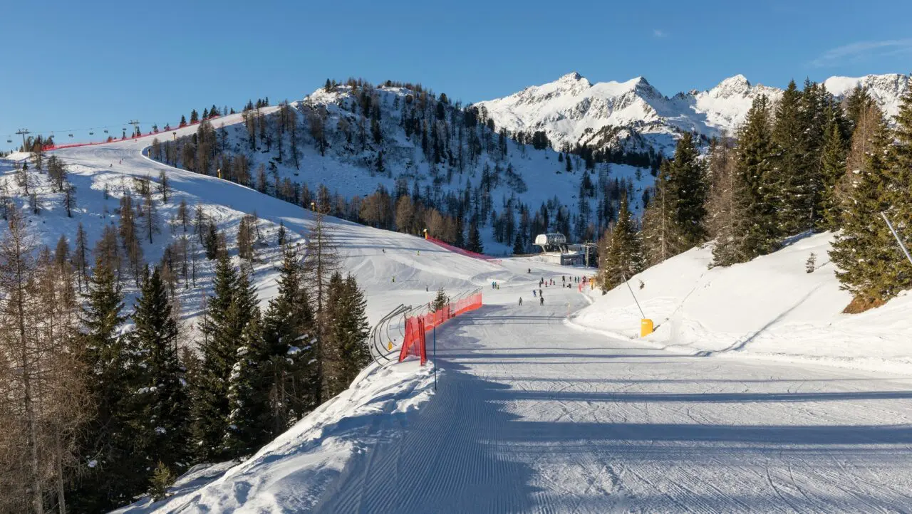 Skiing area in the Dolomites Alps in sunny day. Overlooking the Pista Mastellissima in Marilleva-Folgarida. Brenta. Italy